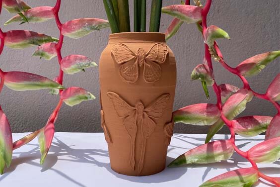 Terracotta butterfly vase